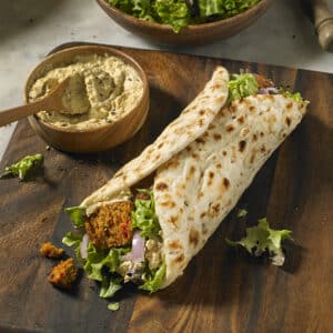 Baked Earth Bakery launches Meditteranean Flatbreads - image of flatbread